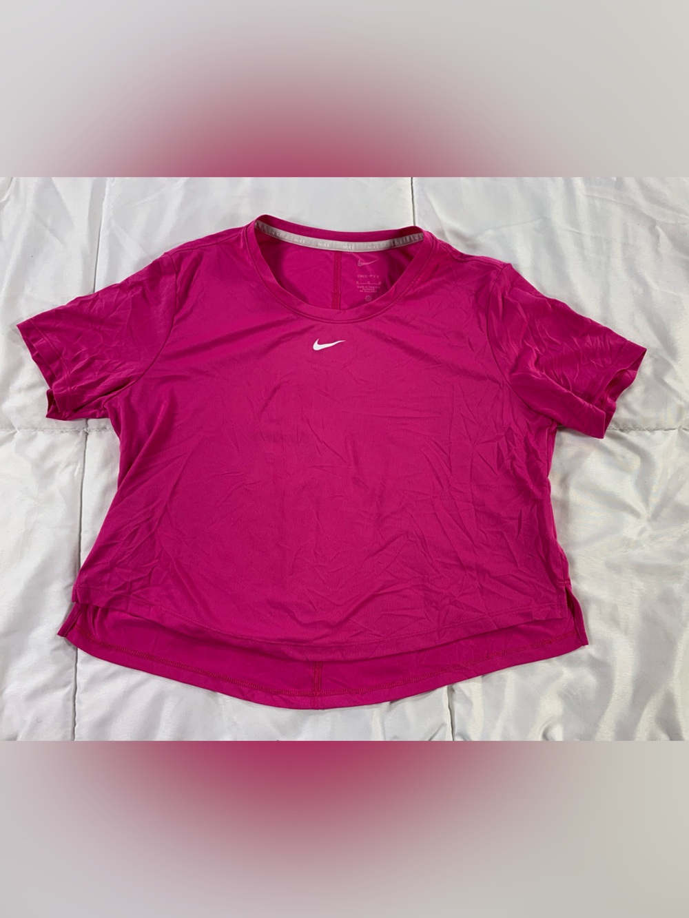 Pre loved NIKE shirt womens size M